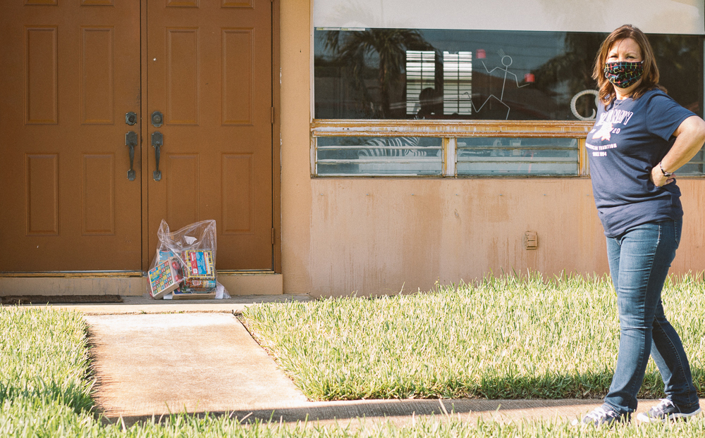 Nurse dropping off bag of toys