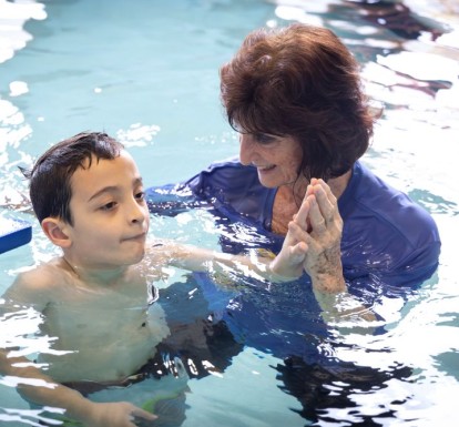 A child with autism learns to swim thanks to a pilot program funded by Children's Services Council of PBC.
