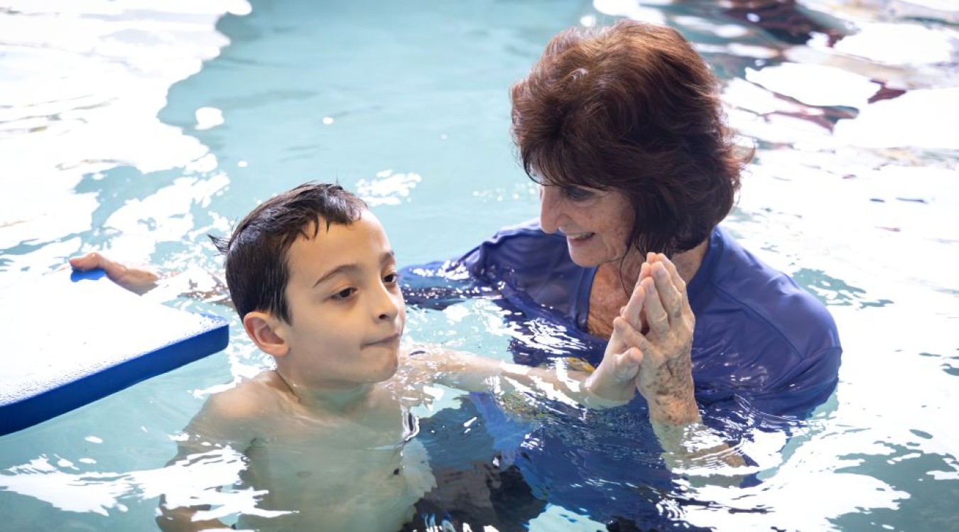 A child with autism learns to swim thanks to a pilot program funded by Children's Services Council of PBC.