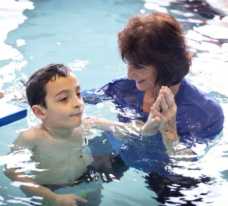 A child with autism learns to swim thanks to a pilot program funded by Children's Services Council of PBC.